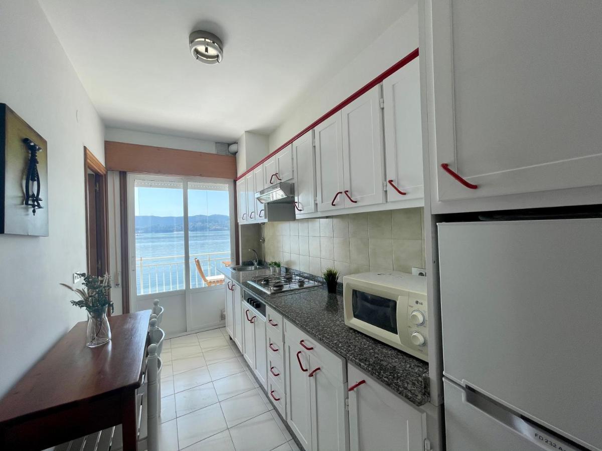 Apartamentos Miramar Playa Raxó Esterno foto